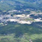 Old Faithful parking area from 11,000 feet